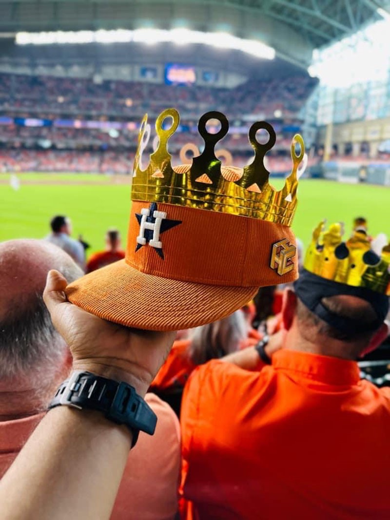 Astros fans bring hundreds of gold crowns to playoff games for King Tuck