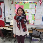 Rena Li, a senior, is wearing a sweater from Urban Outfitters, a scarf from Zara, pants from Anthropologie and shoes from DSW. 