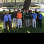 (From left) Brandon Bain, theology teacher Mr. Tommy Romano, Martin Montalvo, Nick Tanner, Felix Read, Patrick Sullivan, Toan Cao, Austin Miller, Jeremy Brown, Michael Blaschke, Thomas Neiers, Brandon Solcher, Fr. Flavio Bravo, Jesuit Father, Head of Past