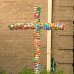 Cross made of Easter eggs