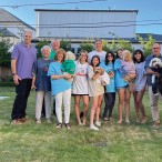 The extended Samuels family, including all five dogs