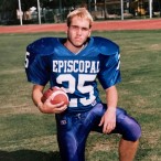 Travis in football uniform