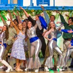 The cast of Mamma Mia during bows on closing night.