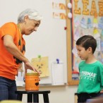 teacher and student with pumpkin