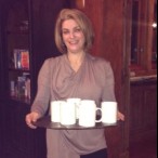 Ilene Kramer serving her fennel and carrot soup at her family's annual holiday party.