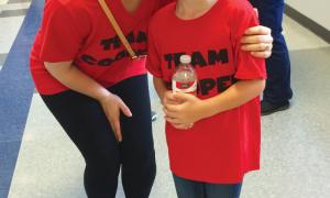 Tricia Garrison, Trinity El-Hakam