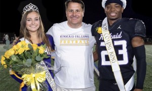 three people on football field