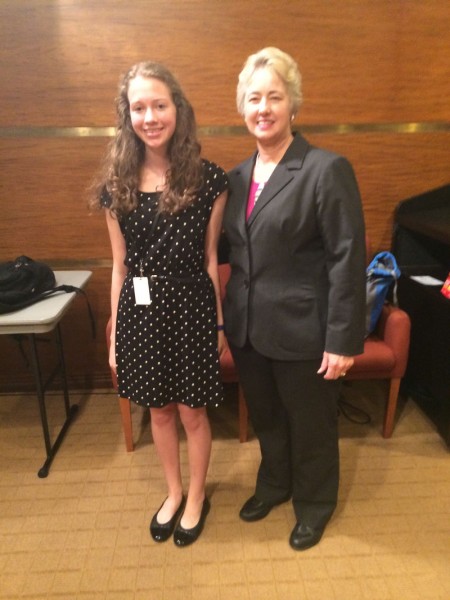 Cara Maines poses for a photo with Mayor Annise Parker after a mock press conference.