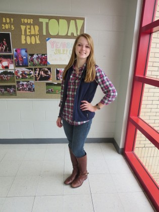 Candace Cravey, a junior, is wearing a Vineyard Vines shirt, vest from tinytulips.com, and both her jeans and shoes are from Nordstrom. 