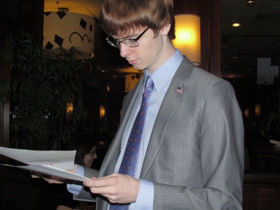 Senior Eric Bailey, in Congressional debate, has qualified to both the NSDA and TOC National Tournaments. He looks over some speeches at the hotel before a tournament. 