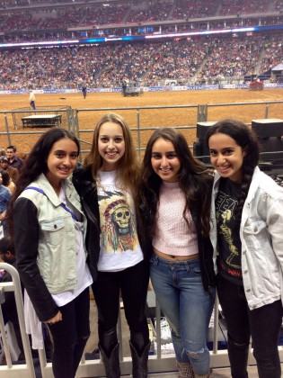 Pictured is native Houstonian Melissa Darlow (second from left) with New Yorkers Negin Safani, Adiel Zakrya, Neda Safani experiencing culture shock at the Houston Livestock Show and Rodeo.
