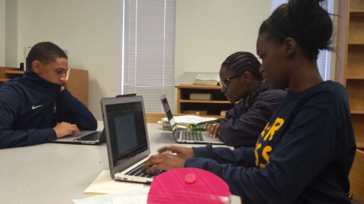 (From left) Derrick Cyprian, Mallory Davis, and Kelsey Wallace preparing for midterms.  