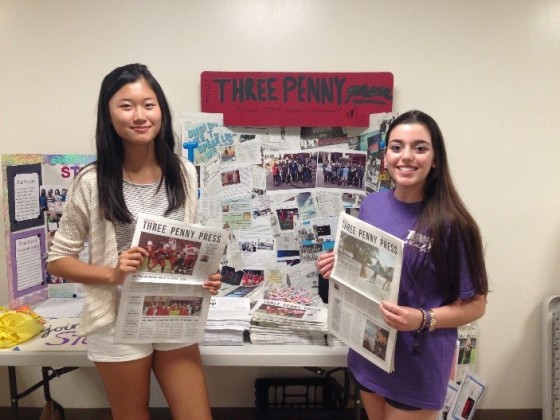Editors-in-Chief encourage freshmen to subscribe to the school newspaper and to join the newspaper staff next year. (From left) Tonya Chen (senior) and Sophie Daily (senior).