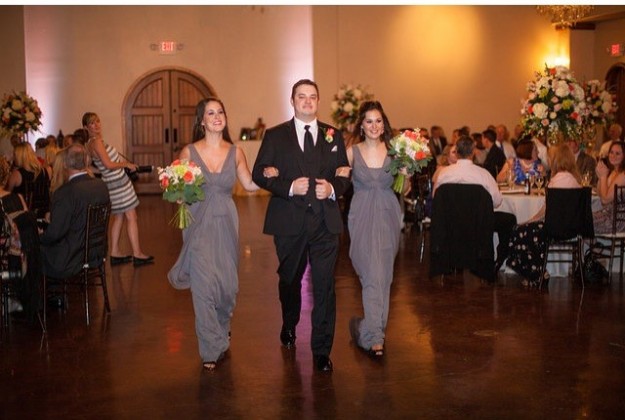  This past May, senior Emma Prestage’s oldest sister got married. Pictured is Emma with her other older sister and the best man during the maid of honors’ entrance into the reception.