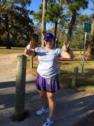 Gisselle Matta, a Bellaire resident, gives a thumbs-up during an outdoor run. 