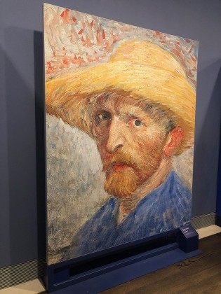 Self-Portrait with a Straw Hat