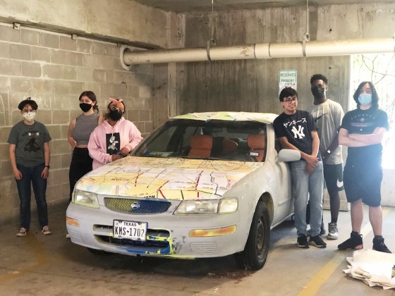 Carnegie students with car