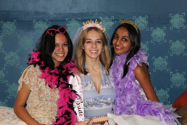 Natalie Lopez (Lisa) and Tulsi Parikh (Ali) helping Ella Davison (Sophie) prepare for her bridal shower