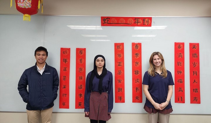 Chinese IV students with calligraphy