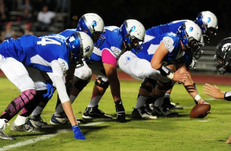 Episcopal High School’s Offensive Line, ready to block the defenders to make a successful play. Their hard work and determination gives them confidence. (Photo: Lisa Erwin)