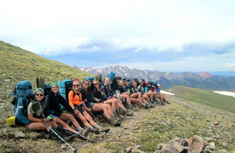 A group of rising seniors gathered to take a break from their long hike in Colorado.
