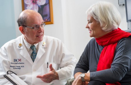 Dr. Ronald Young talks with a patient