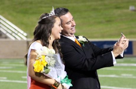 Homecoming Queen Lexi Villarreal snapped a quick selfie with her dad in celebration. (Photo: Abby Boessling)