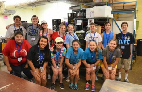 Pictured: Matthew Hall (back row, second from left) and friends after working at the Arlington Food Assistance Center. (Photo: Blake Ruskin.)