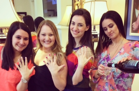 (From left) Sisters Melanie, Melissa and Amy displaying their rings and Lauren, on right, pouring the champagne to toast her younger sister’s engagement. (Photo: Mark Finkelstein) 