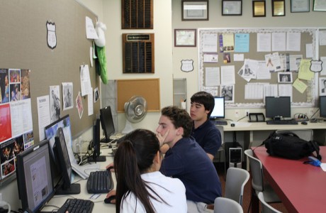 (From left) Jessica Lee, Parker Donaldson, Chris Zimmerman working in The Review room. 