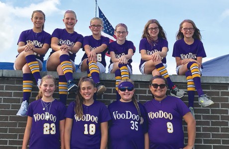 The Houston VooDoo girls’ fast-pitch 10U softball team