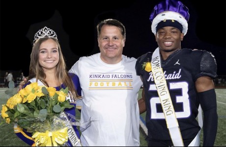 three people on football field