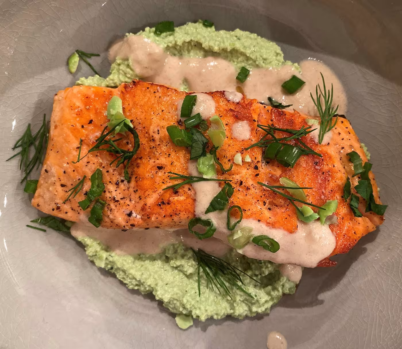 Salmon with Edamame Herb Hummus and Lemon-Tahini Sauce