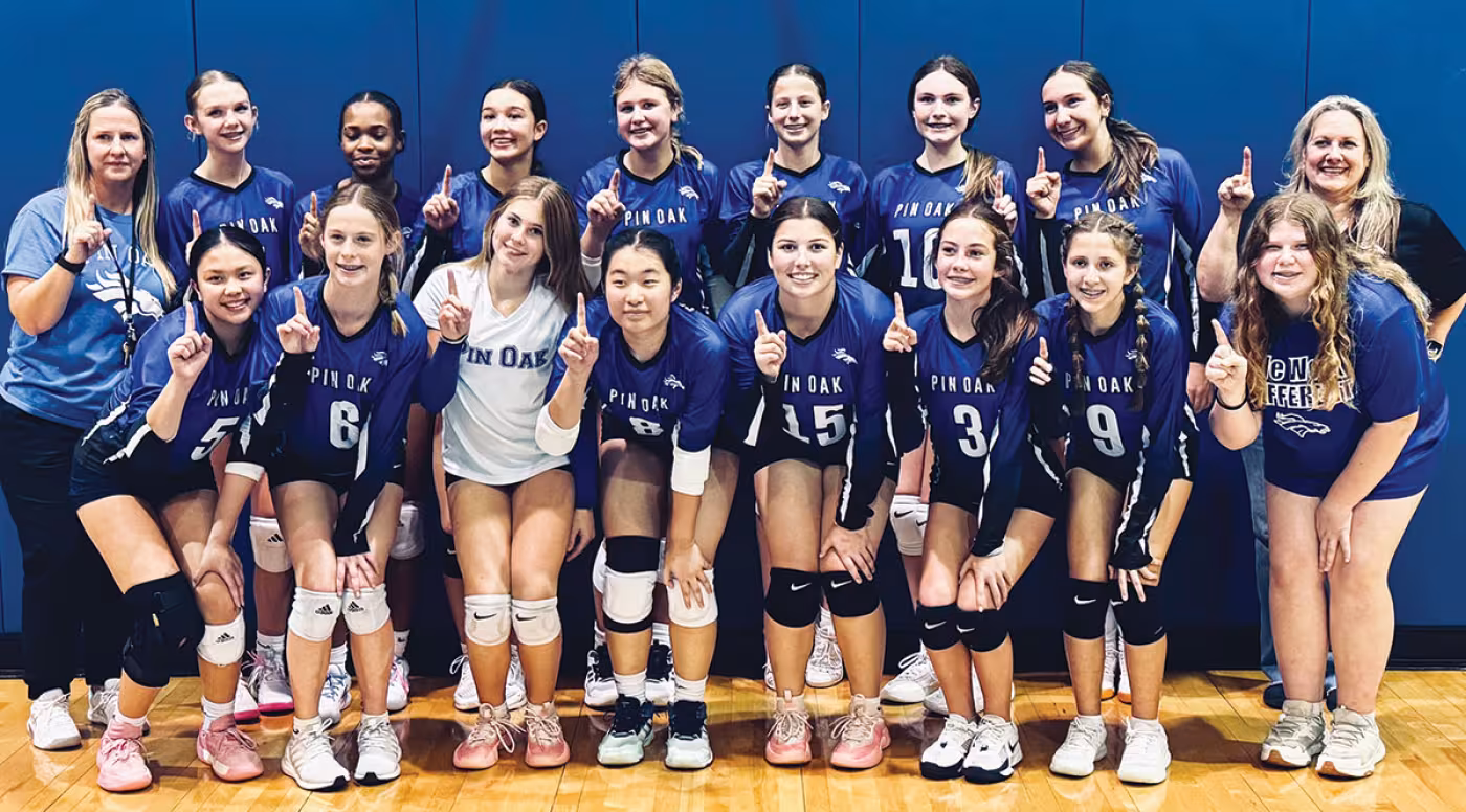 Pin Oak Middle School eighth grade girls’ volleyball team