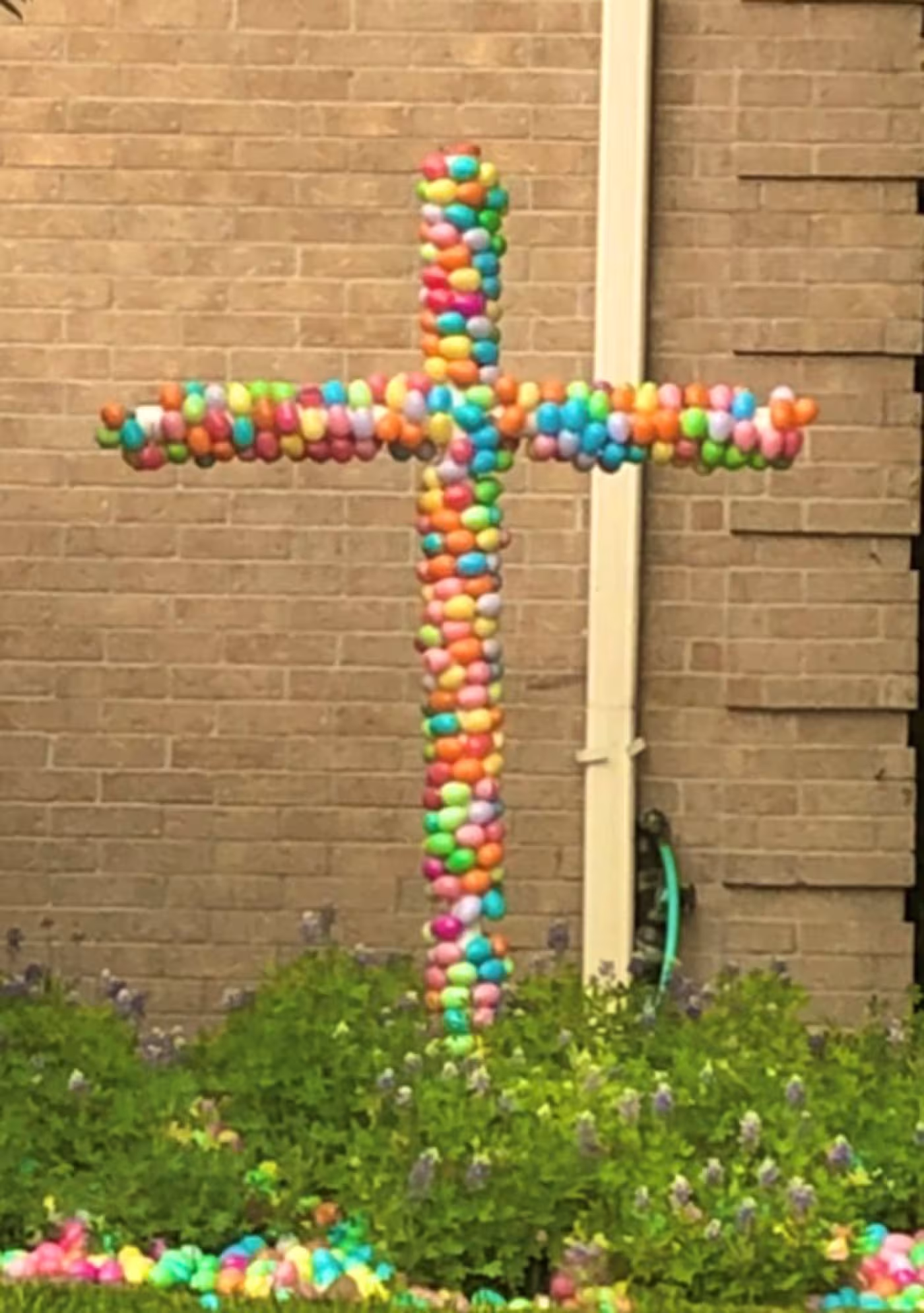 Cross made of Easter eggs