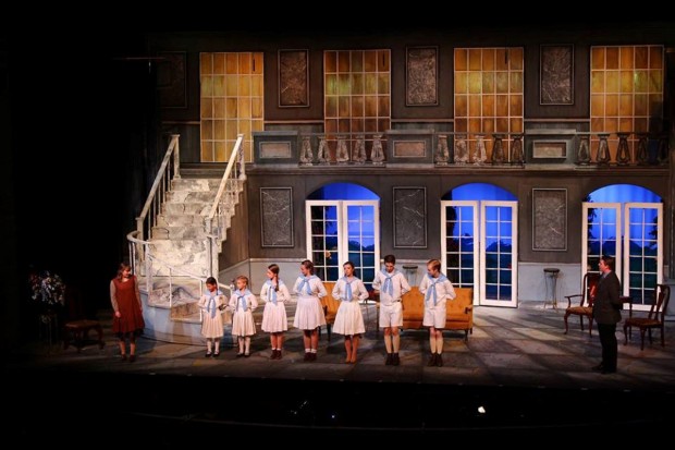 Maria with the seven von Trapp children: Gretl (Amaya Perez), Marta (Isabel Heckler), Brigitta (Kathryn King), Louisa (Libby Carr), Liesl (Mia Heckler), Kurt (Cameron O’Neill), and Friedrich (Cameron Biggart).