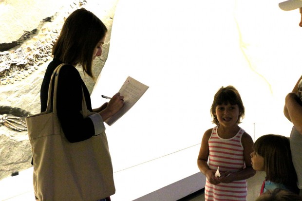 Intern Alex Daily chats with Emma about why she likes the crystal exhibit.