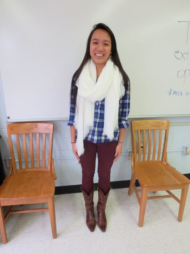 Janice Wang, a senior, is wearing a shirt from Madewell, scarf from Forever 21, pants from Old Navy and Ariat boots. 