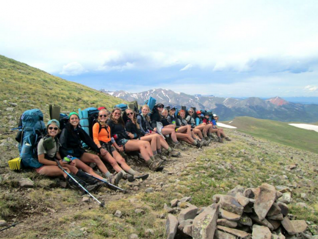 A group of rising seniors gathered to take a break from their long hike in Colorado.