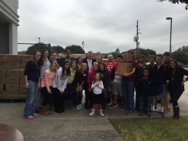 Group photo outside of West Houston Assistance Ministries.  