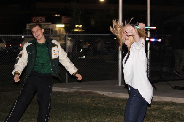 Spartan seniors Grant Haralson and Emily Brown dance to the music provided by junior Chris Hachtman, a Student Council member. 