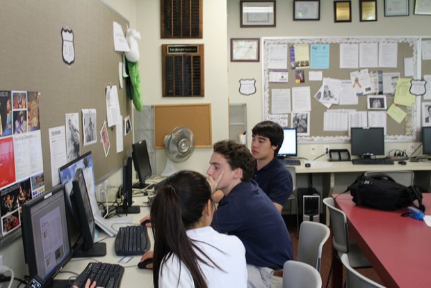 (From left) Jessica Lee, Parker Donaldson, Chris Zimmerman working in The Review room. 