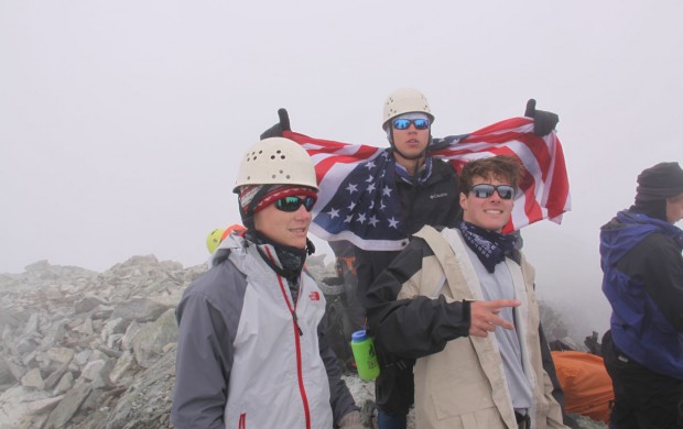 Chris Hachtman, Cole Papageorge and Bryce Hooper celebrate upon reaching the summit. 