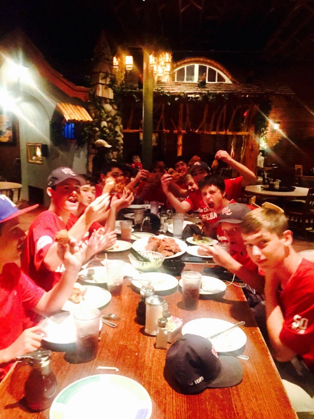 The team celebrating their victory's at Babe's Chicken Dinner House. 