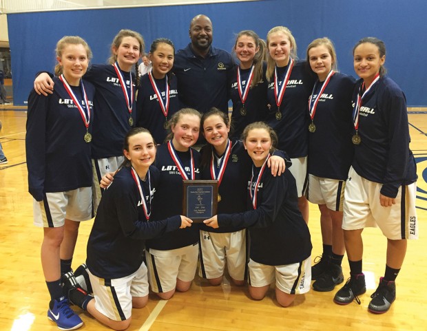 The Second Baptist School eighth-grade girls’ basketball team