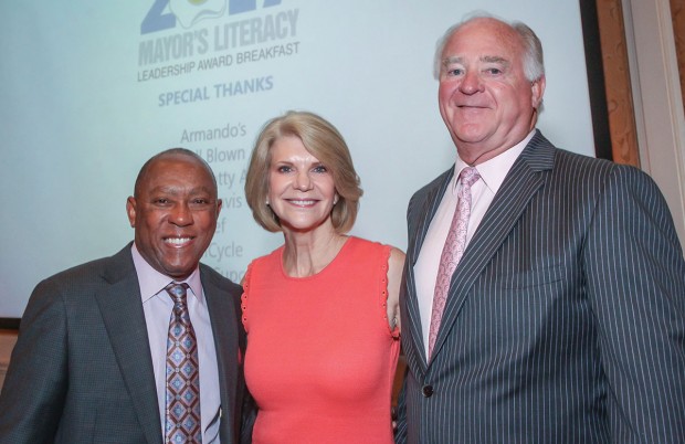 Mayor Sylvester Turner with chairs Kim and Dan Tutcher