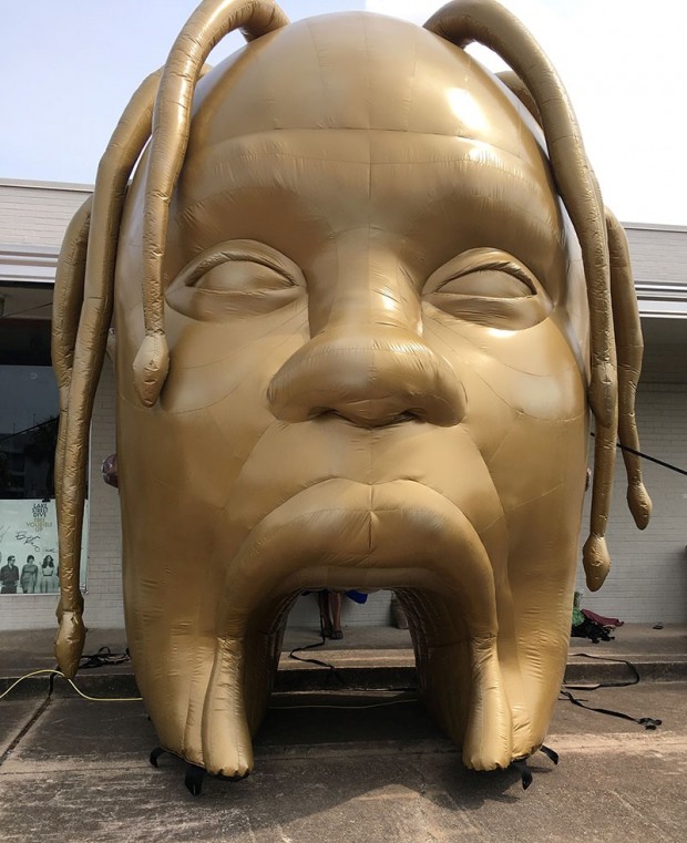 Golden inflatable Travis Scott head