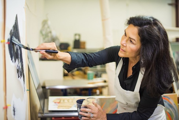 Geraldina Interiano Wise painting in studio Geraldina Interiano Wise painting in studio