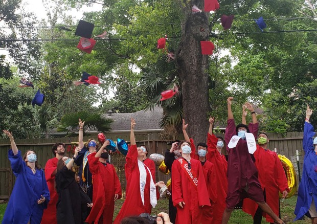 Tossing caps in the air