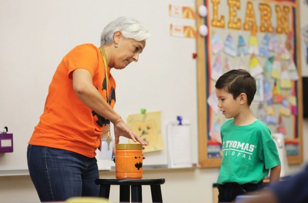 teacher and student with pumpkin